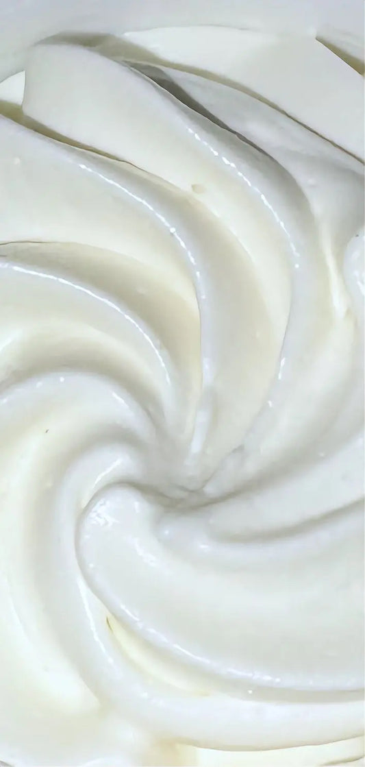 Creamy texture of Vanilla Almond Milk and Honey Body Butter showing rich moisturizing formula